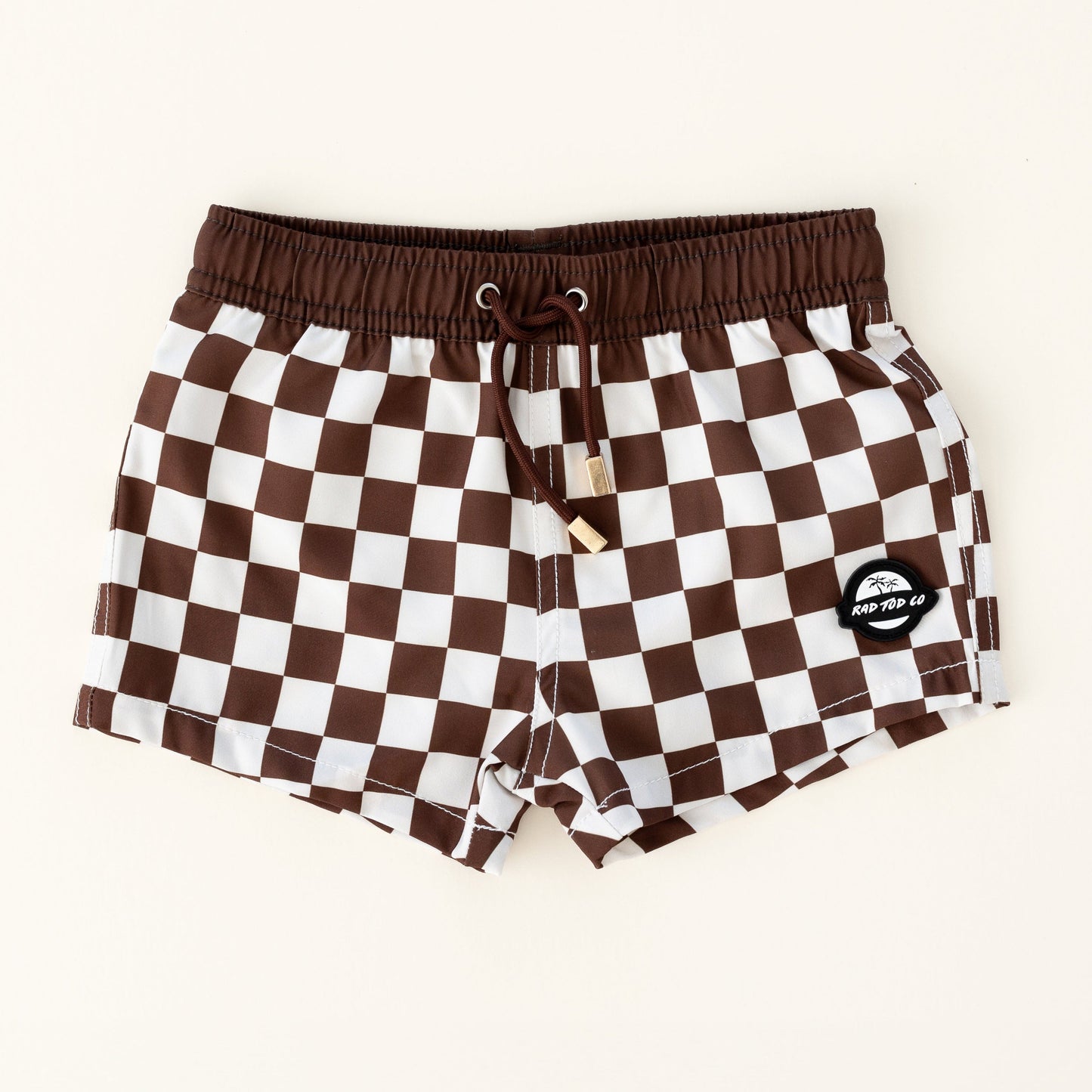 BRONZE CHECKERS TODDLER SWIM TRUNKS