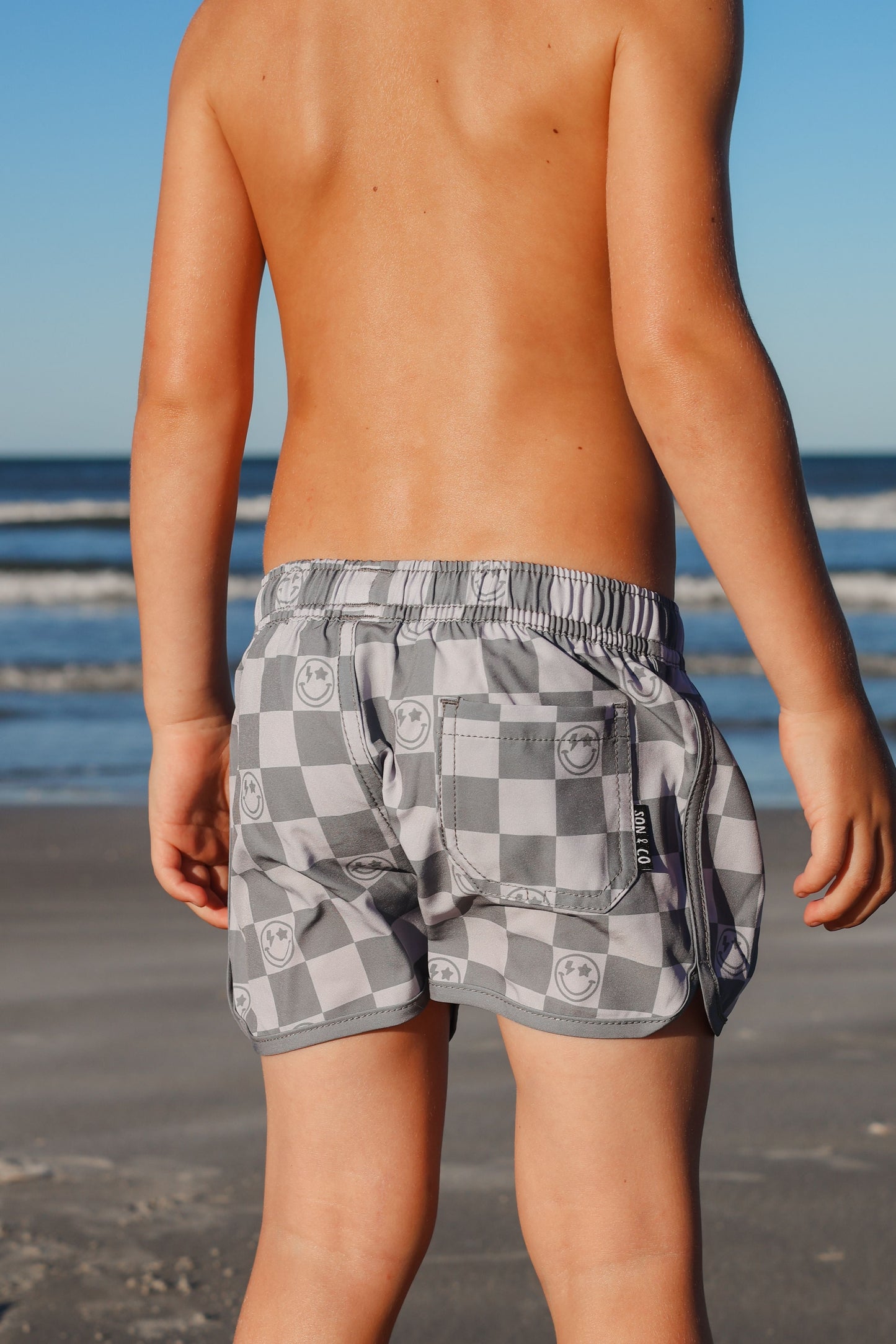 Happy Shores Swim Trunks