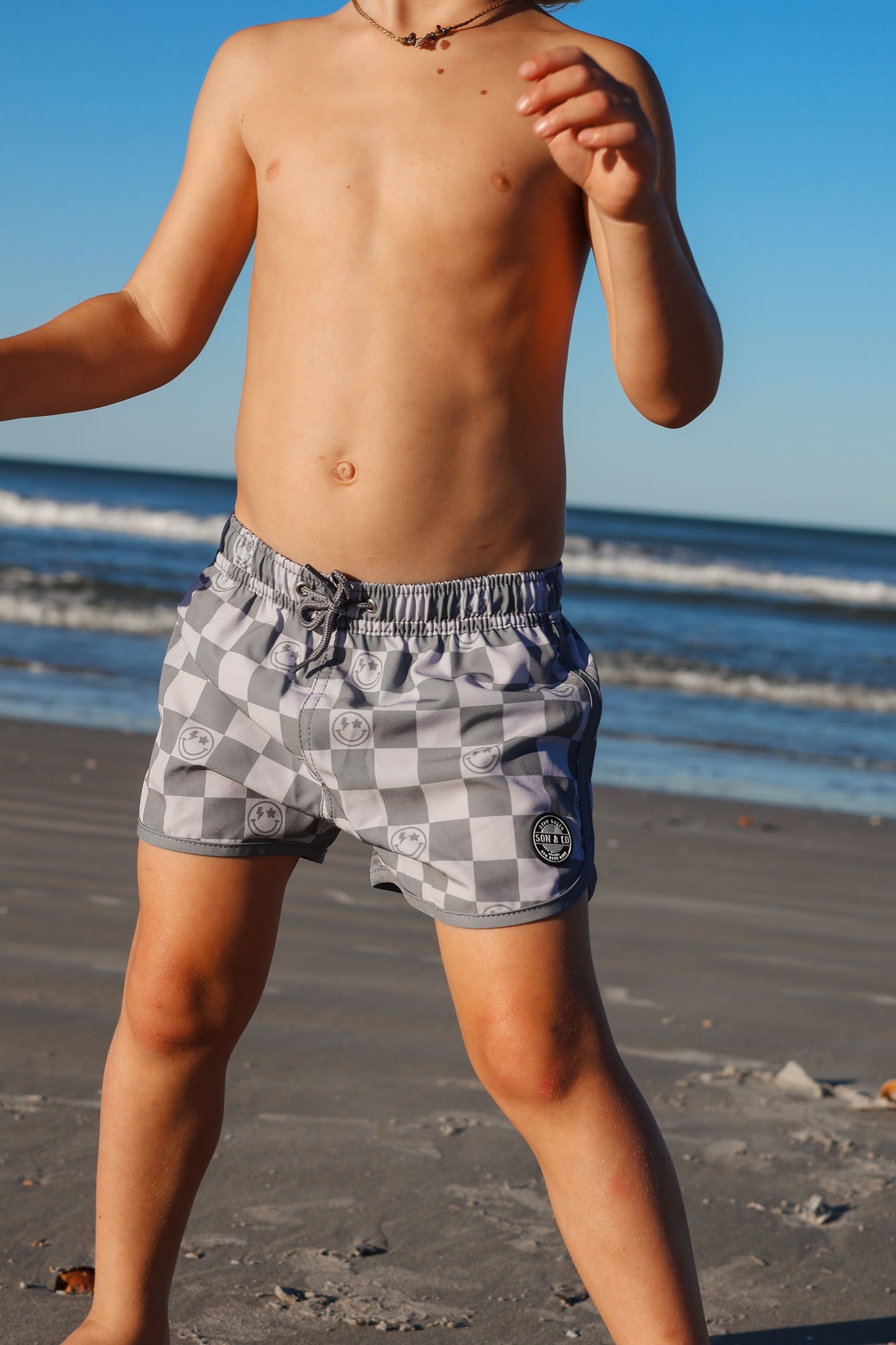 Happy Shores Swim Trunks